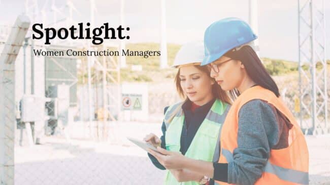 Women in hard hats on a construction site.